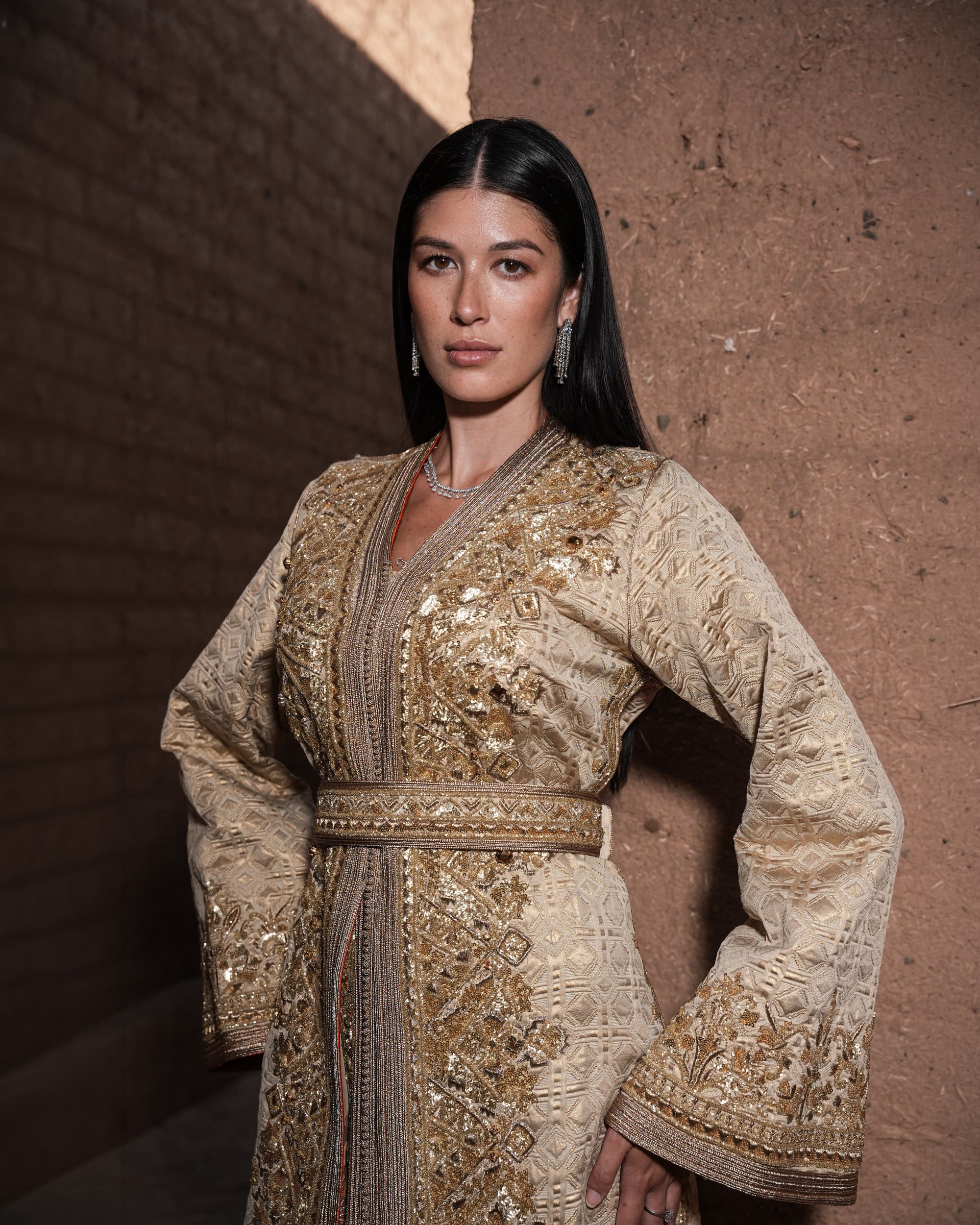 Alabaster Aria quilted ivory brocade Moroccan kaftan with gold sequin embroidery and belted waist, full-length view