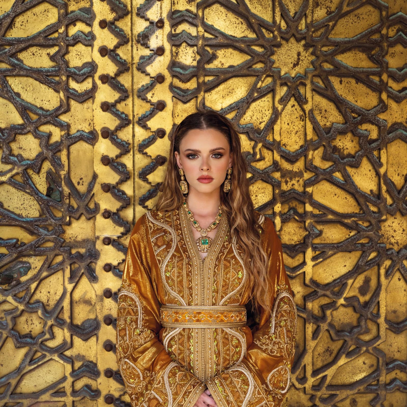 Amber Gate Moroccan kaftan with copper satin sheen and gold embroidery