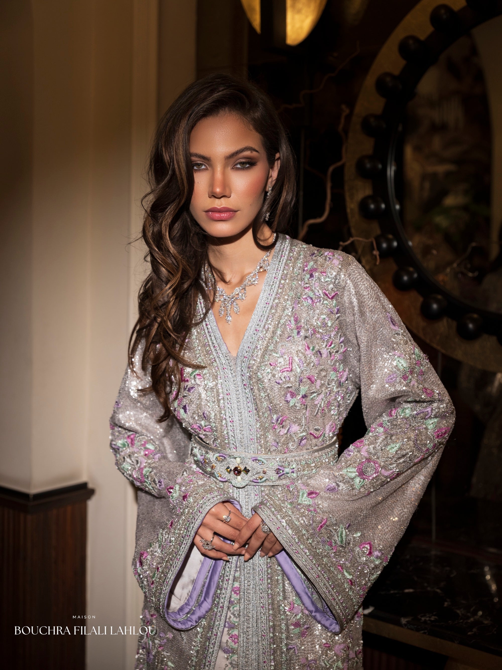 Silver Moroccan caftan detail with lilac mint embroidery and lavender sleeve lining