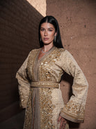 Alabaster Aria quilted ivory brocade Moroccan kaftan with gold sequin embroidery and belted waist, full-length view