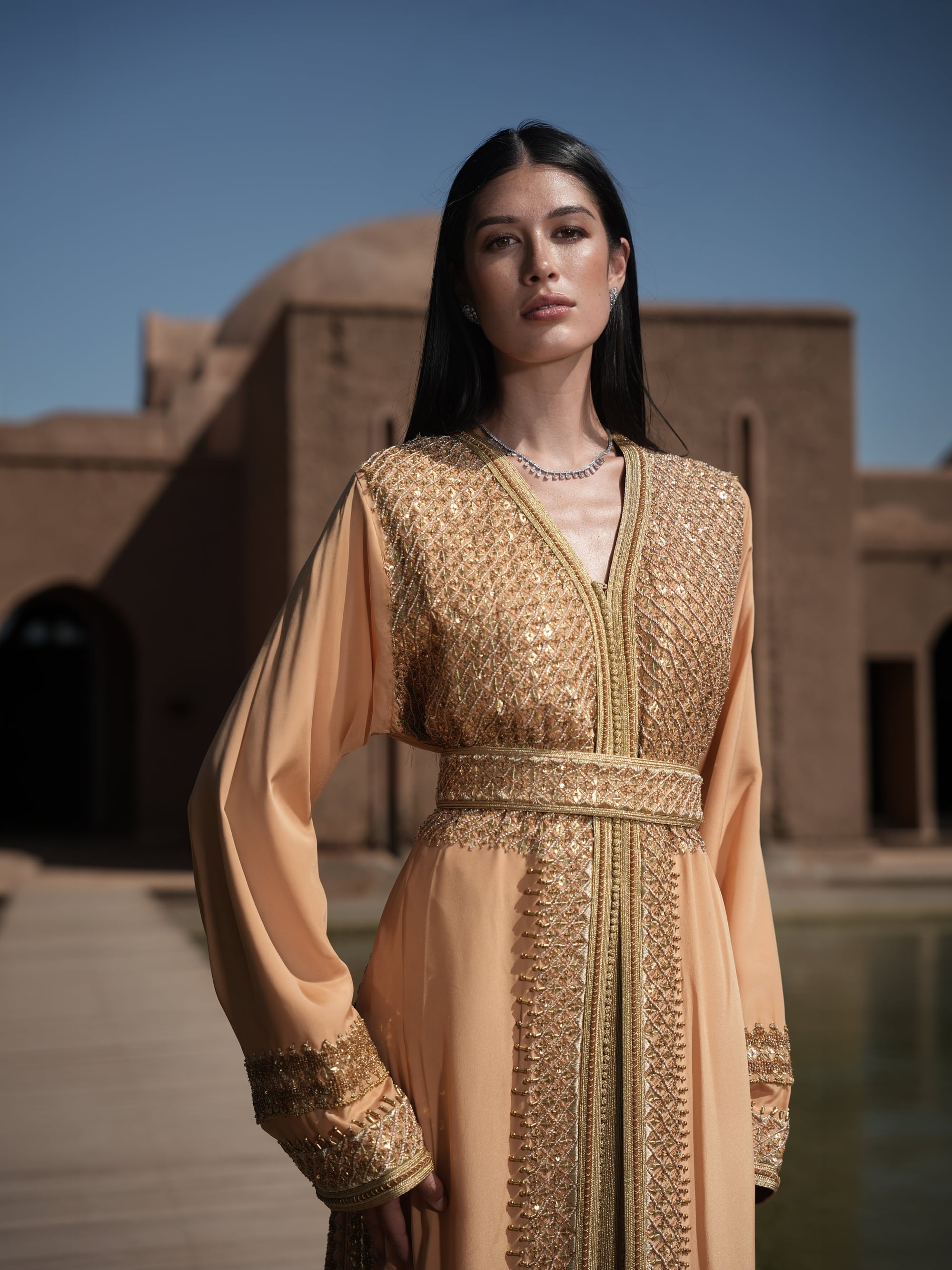 Amber Vigil apricot crepe Moroccan kaftan with a gold sequin mesh plastron at the neckline