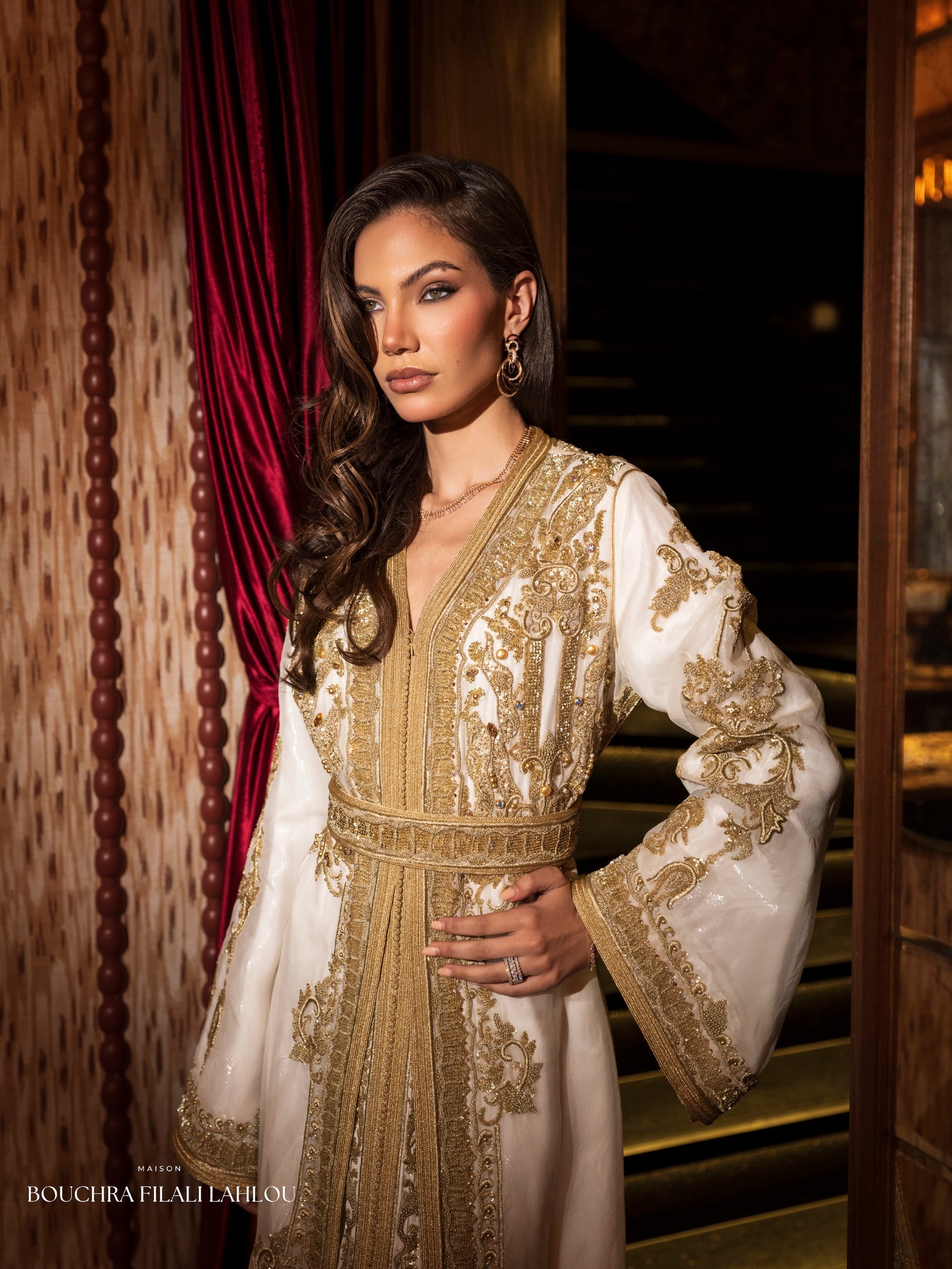 Ivory and gold Moroccan caftan detail with ornate embroidery and refined bridal silhouette